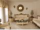 Living room with ornate furniture and a large mirror at 98 Gleneagles Dr, Fayetteville, GA 30215