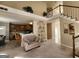 Open concept living area with kitchen and staircase views at 98 Gleneagles Dr, Fayetteville, GA 30215