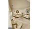 Formal living room with ornate furniture and large mirror at 98 Gleneagles Dr, Fayetteville, GA 30215