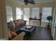 Sunroom with wicker furniture and lake view at 152 Lakeshore Dr, Stockbridge, GA 30281