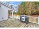 Back deck with grill and private backyard at 3025 Jones Phillips Rd, Dacula, GA 30019