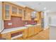 Kitchen boasts ample cabinetry and stainless steel appliances at 3025 Jones Phillips Rd, Dacula, GA 30019