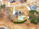 Aerial view of house, pool, and surrounding area at 209 Enfield Ln, Mcdonough, GA 30252