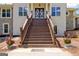 Elegant staircase leading to the grand entryway at 2089 Highway 85 S, Fayetteville, GA 30215