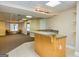 View of a basement wet bar that overlooks the main basement area at 816 Teal Vista, Peachtree City, GA 30269