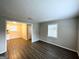 Open living area with grey flooring and neutral walls at 10214 Allen Sw Dr, Covington, GA 30014