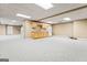 Spacious finished basement with wet bar and ample room for recreation at 240 Edna Ruth Ln, Mcdonough, GA 30253