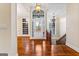Elegant entryway with hardwood floors and staircase at 240 Edna Ruth Ln, Mcdonough, GA 30253