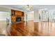 Hardwood floor living room with fireplace and built-in shelves at 240 Edna Ruth Ln, Mcdonough, GA 30253