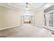 Main bedroom with bathroom access and views of the backyard at 240 Edna Ruth Ln, Mcdonough, GA 30253