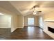 Bright and airy living room with vaulted ceiling and hardwood floors at 1641 Ne Riverchase Ln, Conyers, GA 30013