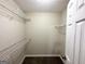 Large walk-in closet with wire shelving at 1641 Ne Riverchase Ln, Conyers, GA 30013