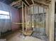 Under construction bathroom with framed walls and window at 2004 Joseph E Boone Nw Blvd, Atlanta, GA 30314