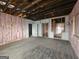 Unfinished bedroom with hardwood floors and exposed beams at 2004 Joseph E Boone Nw Blvd, Atlanta, GA 30314