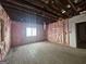 Unfinished bedroom with hardwood floors and window at 2004 Joseph E Boone Nw Blvd, Atlanta, GA 30314