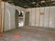 Large entryway with arched doorways and original doors, awaiting renovation at 2004 Joseph E Boone Nw Blvd, Atlanta, GA 30314