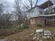 Brick home under construction, partially framed walls, debris at 2004 Joseph E Boone Nw Blvd, Atlanta, GA 30314