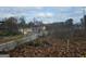 Vacant lot with view of street, gas station and nearby houses at 2004 Joseph E Boone Nw Blvd, Atlanta, GA 30314