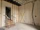 Unfinished staircase with exposed framing and railing at 2004 Joseph E Boone Nw Blvd, Atlanta, GA 30314