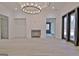 Living room with fireplace and access to sunroom at 115 Grace Hope Dr, Brooks, GA 30205