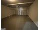 Empty two car garage at 566 Mariposa Ln, Mcdonough, GA 30253