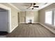 Spacious living room featuring a fireplace and neutral carpeting at 555 Holly Nw St, Atlanta, GA 30318