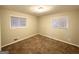 Spacious bedroom with neutral walls and carpet at 1908 Delowe Sw Pl, Atlanta, GA 30311
