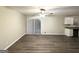 Dining area with vinyl flooring and access to the kitchen at 1908 Delowe Sw Pl, Atlanta, GA 30311