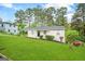 Charming Ranch home with a well-manicured lawn and mature trees at 3809 Clovis Nw Ct, Atlanta, GA 30331