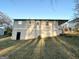 Ranch house exterior with a partial basement and yard at 3809 Clovis Nw Ct, Atlanta, GA 30331