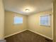 Well-lit bedroom with carpet and window at 757 Alfred Nw Rd, Atlanta, GA 30331