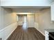 Luminous dining area with hardwood floors and access to kitchen at 757 Alfred Nw Rd, Atlanta, GA 30331