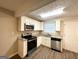 Renovated kitchen, granite counters and stainless steel appliances at 757 Alfred Nw Rd, Atlanta, GA 30331