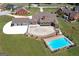 Brick home with pool and large backyard, aerial view at 8555 Spivey Village Trl, Jonesboro, GA 30236