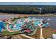 Aerial view of large water park with lake at 8555 Spivey Village Trl, Jonesboro, GA 30236