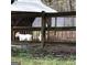 Enclosed area with goats and chicken coop at 2095 Sw Flat Shoals Rd, Conyers, GA 30094
