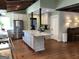 Kitchen island with granite countertop and stainless steel appliances at 2095 Sw Flat Shoals Rd, Conyers, GA 30094