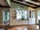 Kitchen with built-in cabinetry and hardwood floors at 2095 Sw Flat Shoals Rd, Conyers, GA 30094