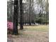 Wooded area with pond and azaleas at 2095 Sw Flat Shoals Rd, Conyers, GA 30094