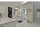Main bathroom with walk-in shower, double vanity, and large closet at 365 Pendleton Trl, Tyrone, GA 30290