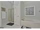 Bathroom with soaking tub, shower, and updated fixtures at 365 Pendleton Trl, Tyrone, GA 30290
