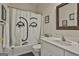 Bathroom with a tub shower combo and updated vanity at 365 Pendleton Trl, Tyrone, GA 30290