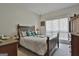 Bright bedroom with a double bed and window coverings at 365 Pendleton Trl, Tyrone, GA 30290