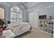 Bedroom with a full bed and cloud-themed ceiling at 365 Pendleton Trl, Tyrone, GA 30290