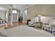 Elegant entryway with hardwood floors, a column, and seating area at 365 Pendleton Trl, Tyrone, GA 30290