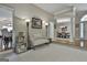 Spacious entryway with hardwood floors and views into the dining room at 365 Pendleton Trl, Tyrone, GA 30290