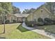 Ranch style home with stone accents and landscaped lawn at 365 Pendleton Trl, Tyrone, GA 30290