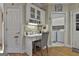 Functional laundry room with washer, dryer, and additional storage at 365 Pendleton Trl, Tyrone, GA 30290