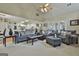 Open living room with hardwood floors, and view into kitchen at 365 Pendleton Trl, Tyrone, GA 30290