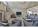 Relaxing living room with built-in shelves and fireplace at 365 Pendleton Trl, Tyrone, GA 30290